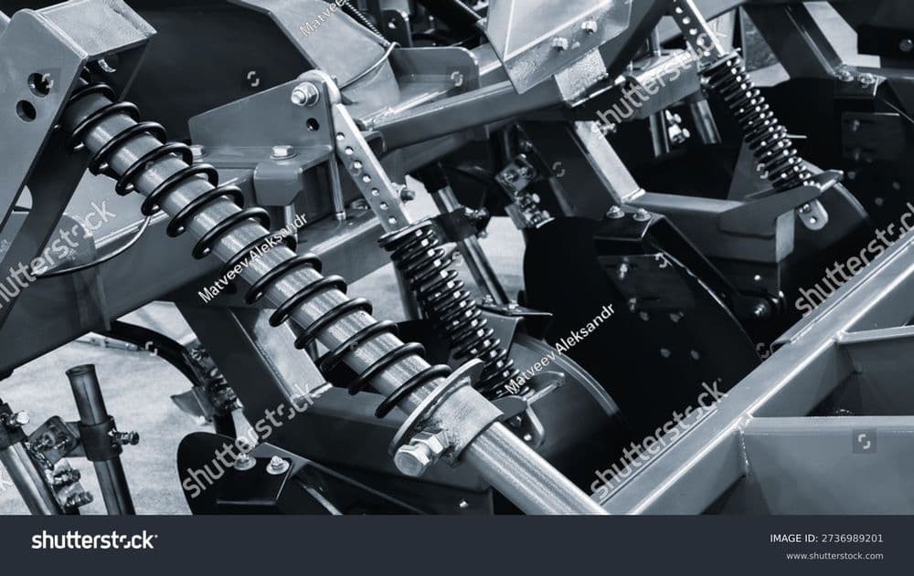 stock-photo-plow-mechanism-with-springs-springs-are-attached-to-mechanism-and-clearly-visible-industrial-2736989201.jpg