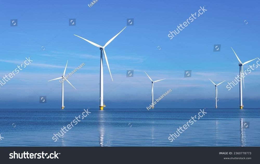 stock-photo-windmill-park-with-clouds-and-a-blue-sky-wind-mill-turbines-in-the-ocean-aerial-view-of-a-wind-2360778773.jpg
