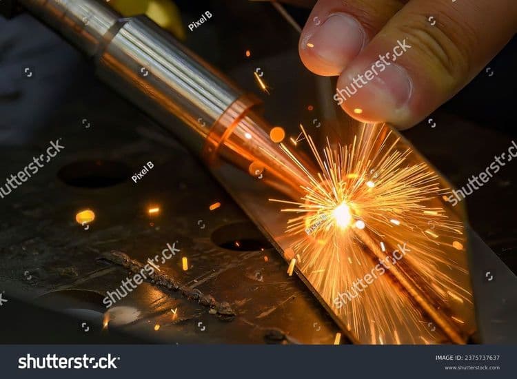stock-photo-close-up-scene-the-laser-welding-process-with-the-sparking-light-the-construction-working-concept-2375737637.jpg