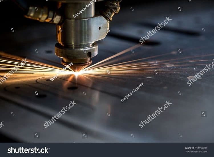 stock-photo-cutting-of-metal-sparks-fly-from-laser-318330188.jpg