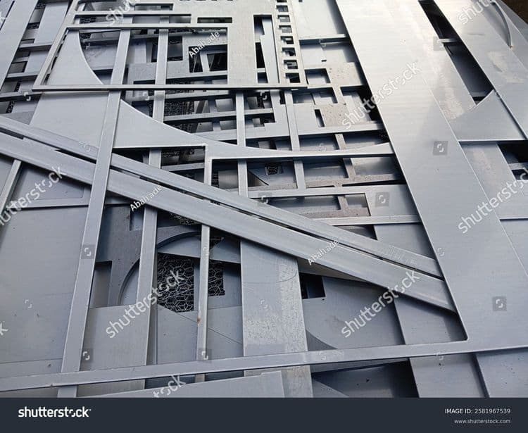 stock-photo-laser-cutting-plates-in-various-shapes-ready-to-be-assembled-2581967539.jpg