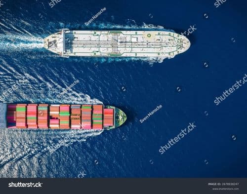 stock-photo-aerial-overhead-view-of-a-cargo-container-ship-and-a-crude-oil-tanker-crossing-the-ocean-as-a-2678938247.jpg