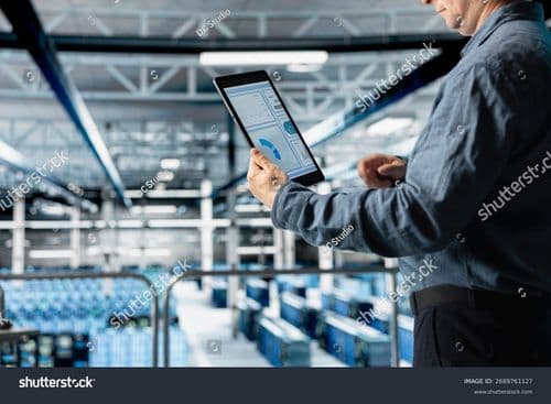 stock-photo-close-up-of-data-center-admin-checking-infrastructure-diagnostics-interface-on-tablet-screen-it-2689761127.jpg